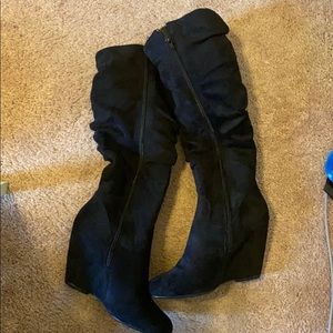 Black boots gently worn
